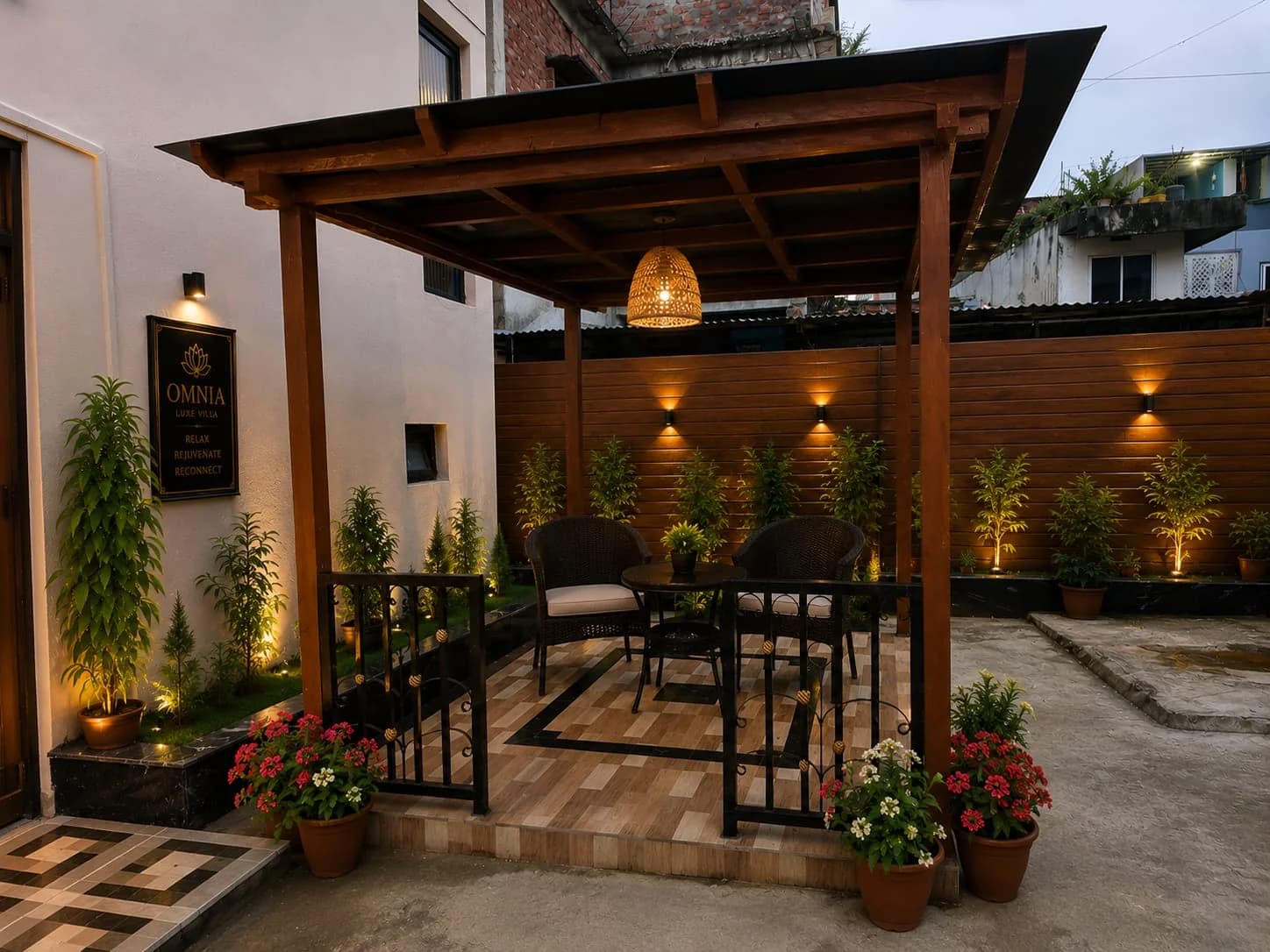 Front-yard pergola with Omnia sign and lantern