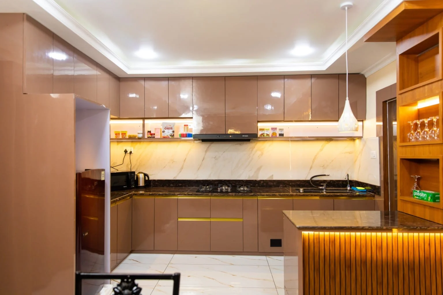 Modern kitchen with marble splashback and island bar