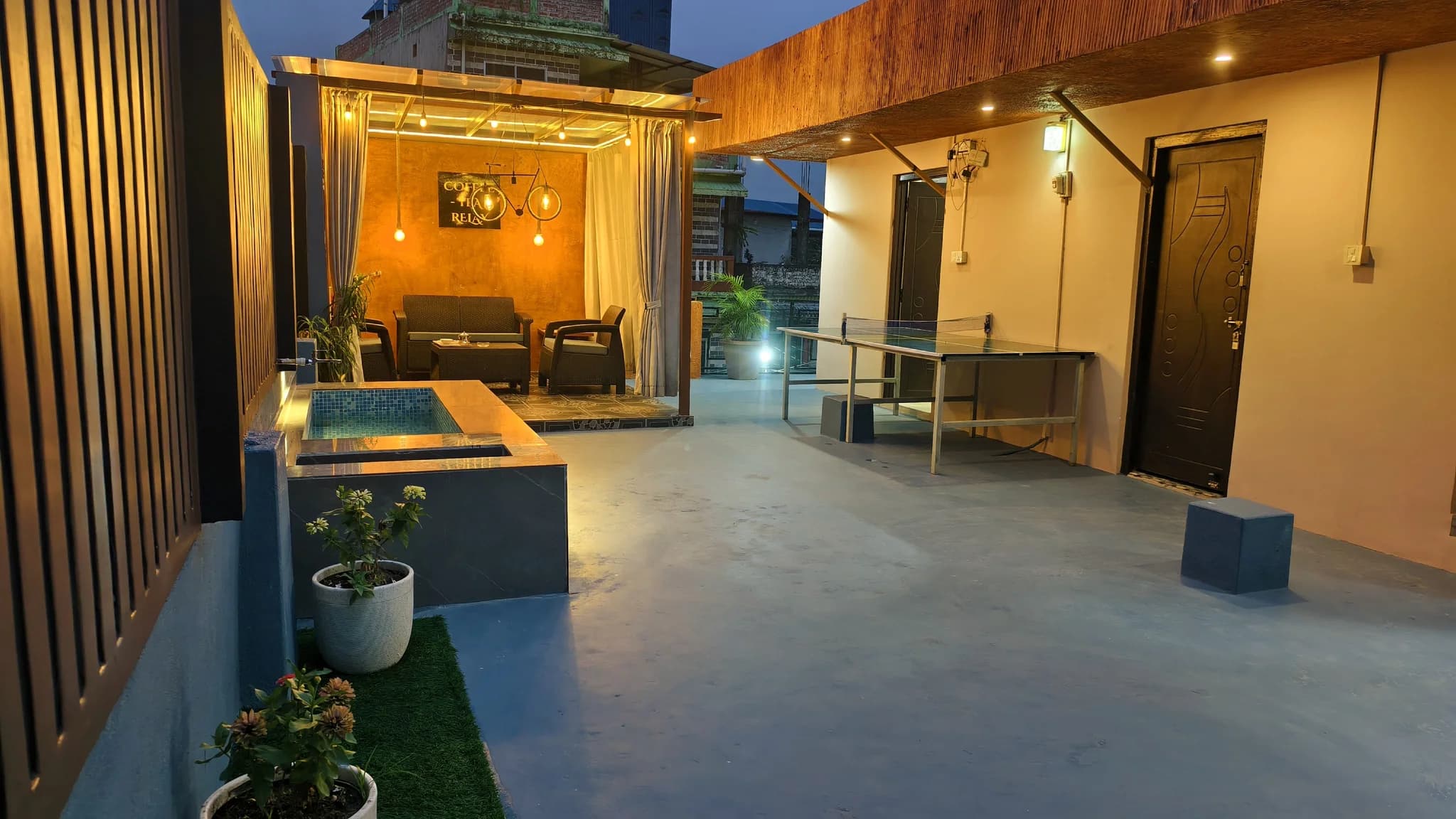 Rooftop games and lounge area at Omnia Luxe Villa